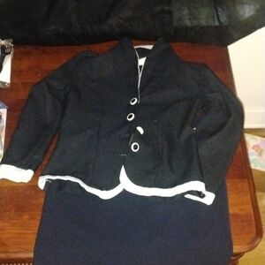 Stylish Black Jacket with White Trim